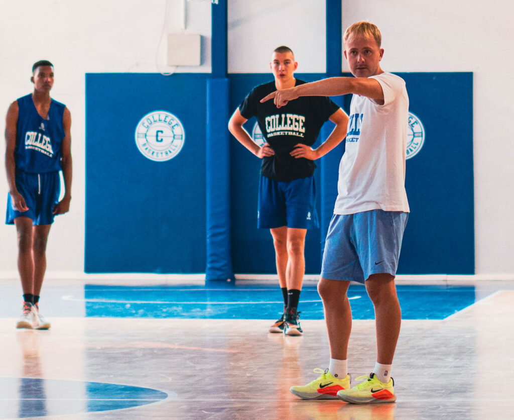 Alex Sarama coaching players during a College Prep training session.